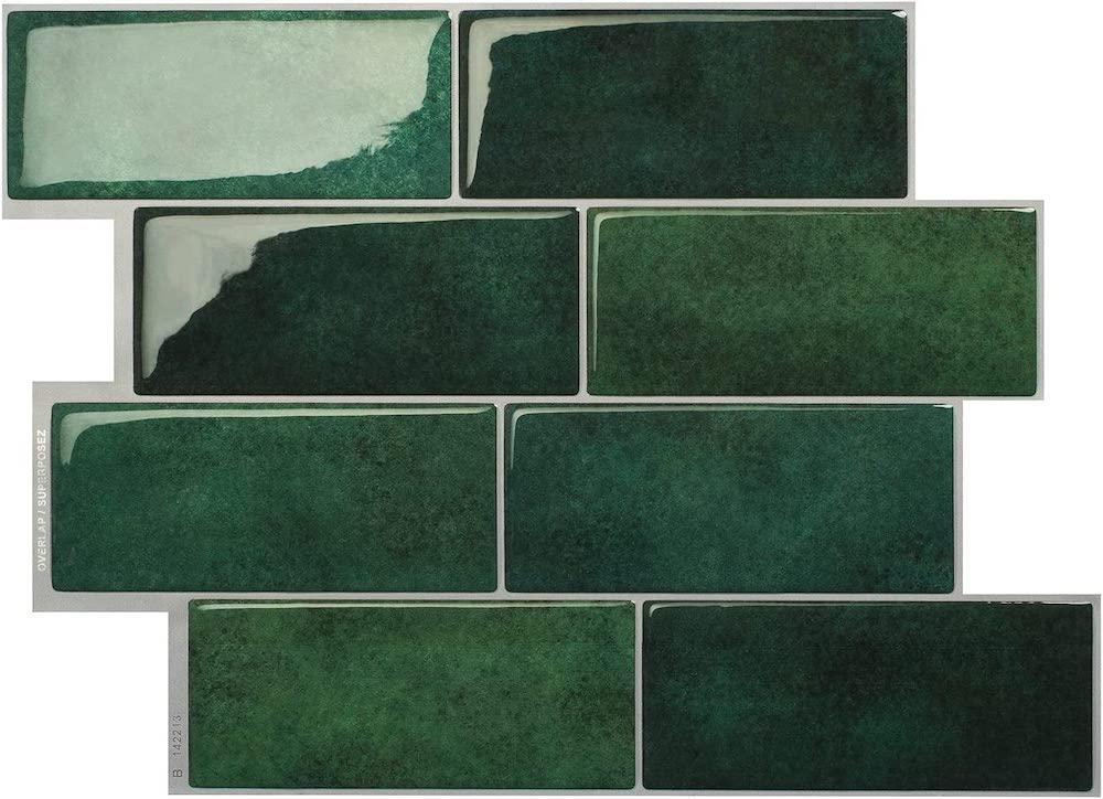 Green peel-and-stick tile wallpaper.