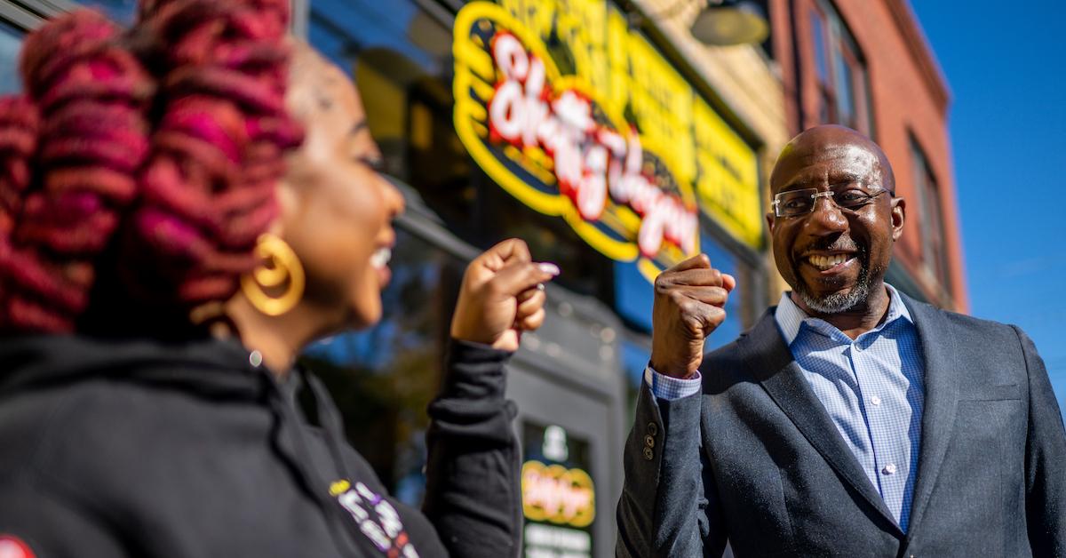 Sen. Raphael Warnock and Pinky Cole at Slutty Vegan