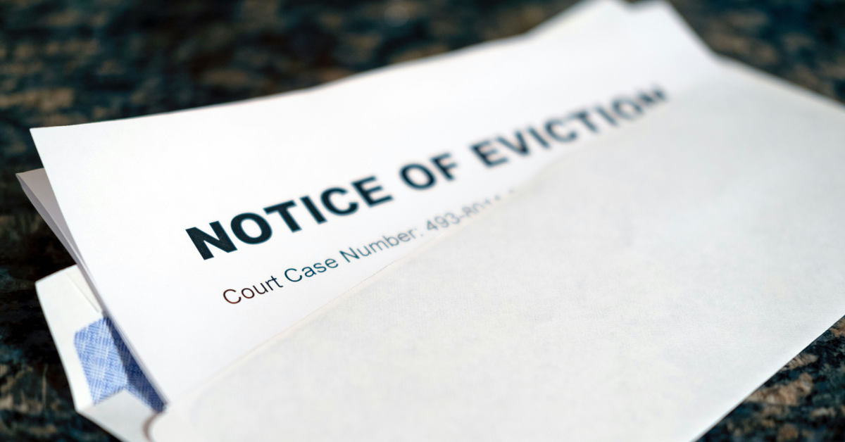 An envelope contains a notice of eviction document