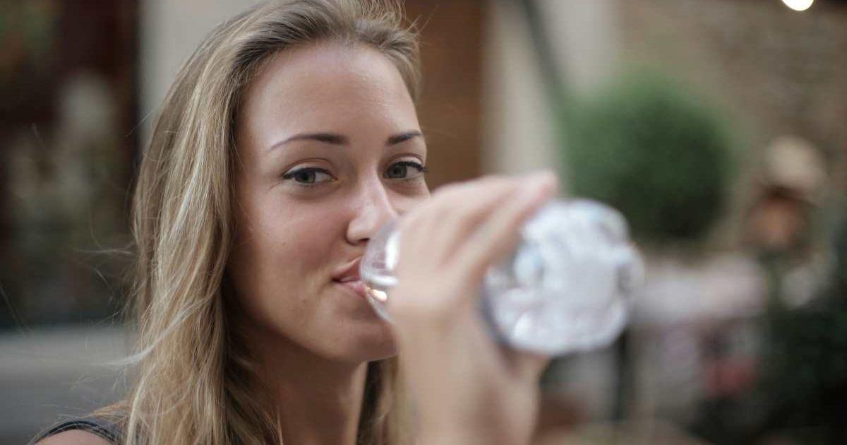 Woman drinking water from a glass (Representative Cover Image Source: Pexels | Photo by Andrea Piacquadio)