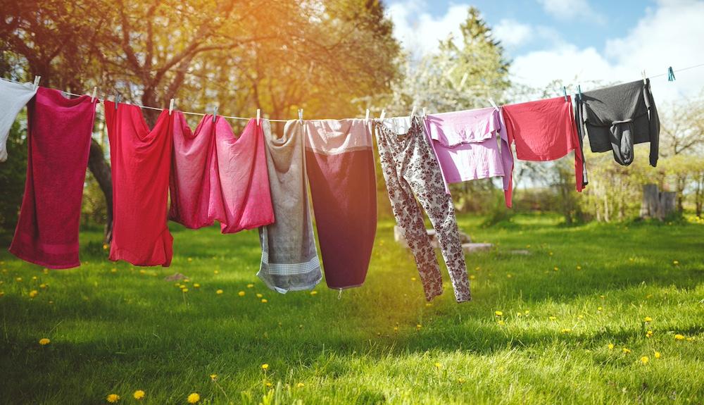 Various clothes on a clothesline on a sunny day. 