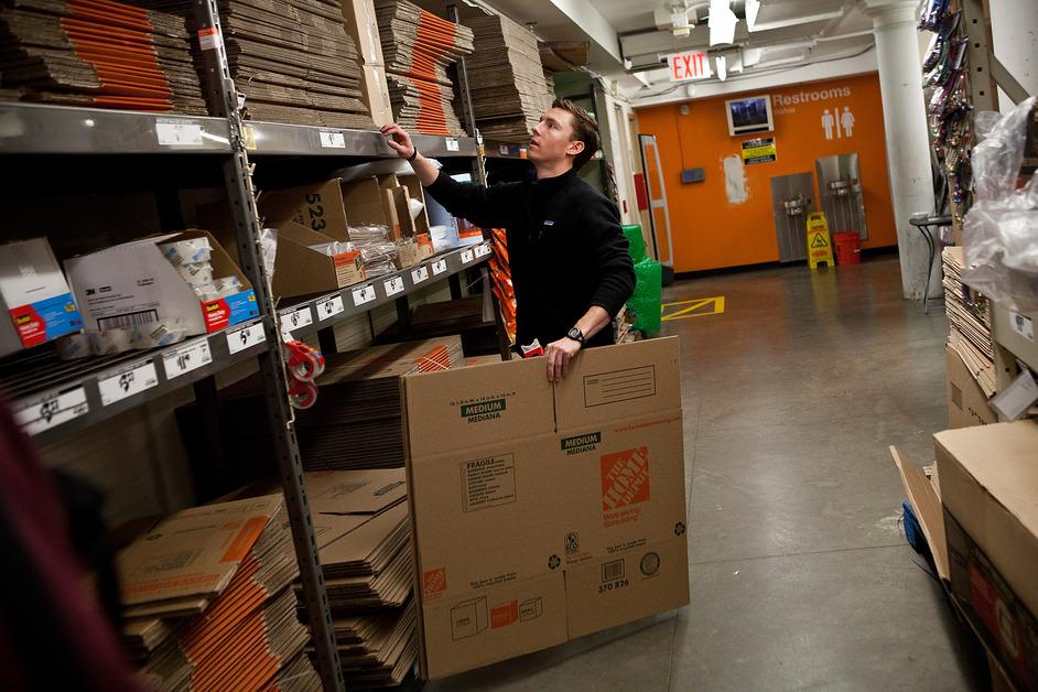 Man buying cardboard from Home Depot. 