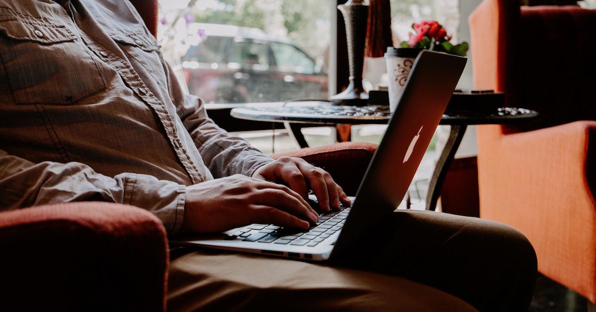 Working on a laptop in a coffee shop